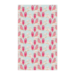 A patterned fabric featuring rows of cute pink owls and smaller white flowers against a light blue background. The owls, created in a Surrealism style, have heart-shaped faces and a playful