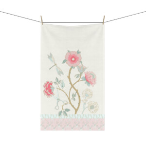Decorative cloth hanging in Park West, featuring a whimsical floral and vine design with pastel pink and blue flowers, and subtle green leaves on a pale background.
