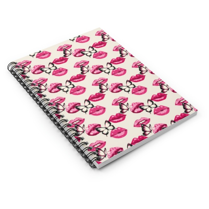 Lip Service in Pink Spiral Notebook - Ruled Line with a whimsical pattern of red lips and black bows, angled slightly with a white background.