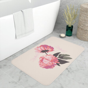 A stylish bathroom with a pastel-colored, floral-patterned bath mat in front of a contemporary bathtub. Decor includes a wicker basket and green plants in a blue vase, enhanced by a surrealism