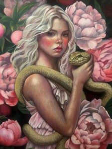 A young woman with flowing blonde hair stands amidst large pink peonies, holding a light-colored snake that wraps around her arm and shoulders. She gazes forward with a calm expression, blending into the vibrant floral background.